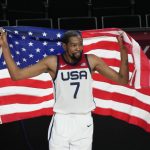 
              United States' Kevin Durant (7) celebrates after their win in the men's basketball gold medal game against France at the 2020 Summer Olympics, Saturday, Aug. 7, 2021, in Saitama, Japan. (AP Photo/Luca Bruno)
            