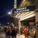 
              FILE - The marquee of the Egyptian Theatre promotes the 2020 Sundance Film Festival in Park City, Utah on Jan. 28, 2020. The 2022 Festival is requiring people attending the festival or Sundance-affiliated events to have received the COVID-19 vaccine. (Photo by Arthur Mola/Invision/AP, File)
            