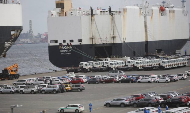 FILE - In this Sept. 29, 2020, file photo, cars wait to be exported at Yokohama port, near Tokyo. J...