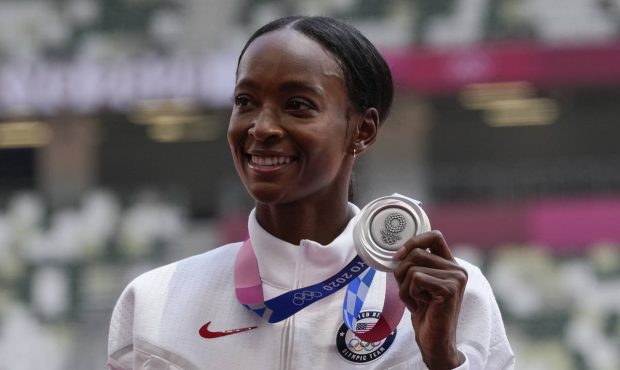 Silver medalist Dalilah Muhammad, of the United States, poses during the medal ceremony for the wom...