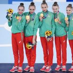 
              Bulgaria's rhythmic gymnastics' team, Simona Dyankova, Stefani Kiryakova, Madlen Radukanova, Laura Traets and Erika Zafirova, pose after winning the gold medal for group all-around rhythmic gymnastics at the at the 2020 Summer Olympics, Sunday, Aug. 8, 2021, in Tokyo, Japan. (AP Photo/Natacha Pisarenko)
            