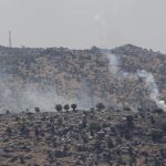 
              Smoke rise from Israeli shelling near the southern Lebanese village of Kfar Shouba, after Hezbollah fired rockets near an Israeli positions the Golan Heights, Friday, Aug. 6, 2021. The militant Hezbollah group said it fired a barrage of rockets near Israeli positions close to the Lebanese border on Friday, calling it retaliation for Israeli airstrikes on southern Lebanon a day earlier. (AP Photo/Mohammed Zaatari)
            