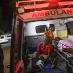 
              Injured people sit in the ambulance that transferred them from another town to the Immaculee Conception hospital in Les Cayes, Haiti, Tuesday, Aug. 17, 2021, three days after an earthquake struck the southwestern part of the nation. (AP Photo/Matias Delacroix)
            