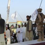 
              Taliban commando fighters and officials attend a gathering to celebrate their victory in Lashkar Gah, Helmand province, southwestern, Afghanistan, Friday, Aug. 27, 2021. (AP Photo/Abdul Khaliq)
            