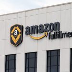 
              FILE - This July 8, 2019, file photo, shows the Amazon Fulfillment warehouse in Shakopee, Minn. Starting Monday, Aug. 9, 2021, Amazon will be requiring all of its 900,000 U.S. warehouse workers to wear masks indoors, regardless of their vaccination status.  The move follows steps by a slew of other retailers, including Walmart and Target, to mandate masks for their workers. In many of those cases the mandates apply to workers in locations of substantial COVID-19 transmission. 
(AP Photo/Jim Mone, File)
            