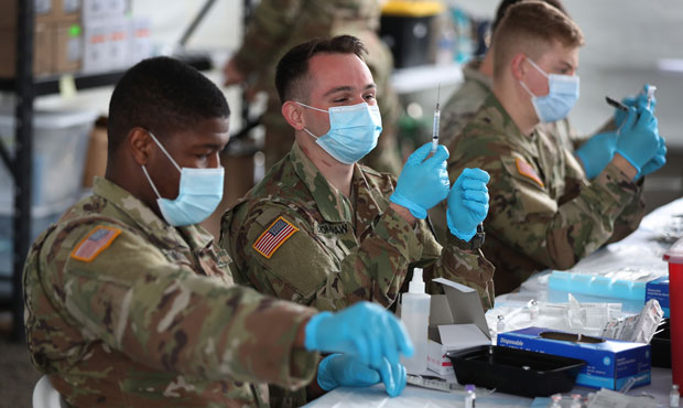 Members of the U.S. military would be required to have the COVID-19 vaccine beginning Sept. 15 unde...