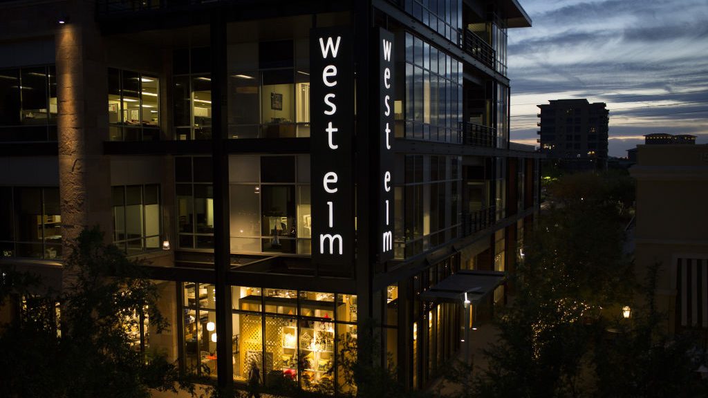 A West Elm Inc. store stands illuminated at night inside the Scottsdale Quarter shopping mall in Sc...
