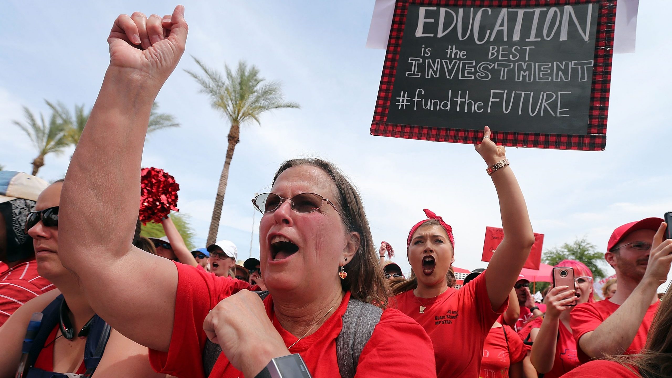Arizona teachers chant in support of the #REDforED movement in front of the State Capitol on April ...