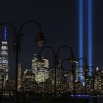 
              FILE - In this Sept. 11, 2020, file photo tribute in Light, two vertical columns of light representing the fallen towers of the World Trade Center shine against the lower Manhattan skyline on the 19th anniversary of the Sept. 11, 2001, terror attacks, seen from Jersey City, N.J. As the 20th anniversary of the Sept. 11, 2001, terrorist attacks approaches, Americans increasingly balk at intrusive government surveillance in the name of national security, and only about a third believe that the wars in Afghanistan and Iraq were worth fighting, according to a new poll by The Associated Press-NORC Center for Public Affairs Research. (AP Photo/Stefan Jeremiah, File)
            
