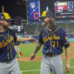 
              Milwaukee Brewers starter Corbin Burnes, left, and reliever Josh Hader celebrate after pitching a combined no-hitter against the Cleveland Indians in a baseball game in Cleveland, Saturday, Sept. 11, 2021. (AP Photo/Phil Long)
            