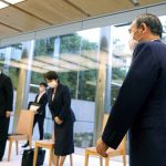 
              Japanese Primm Minister Yoshihide Suga, right, arrives to meet International Paralympic Committee President Andrew Parsons, in Tokyo Friday, Sept.3, 2021. Suga said Friday he won’t run for leadership of the governing party at the end of this month, paving the way for a new Japanese leader after just a year in office. (Behrouz Mehri/Pool Photo via AP)
            