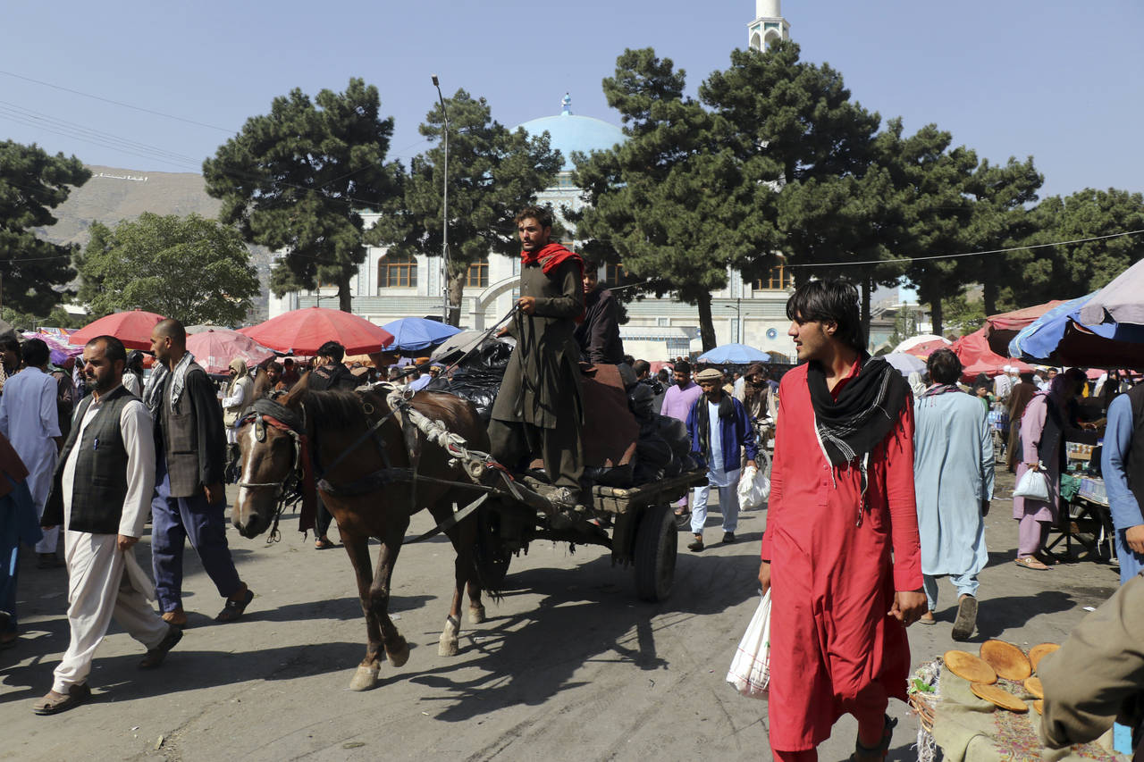 People walk on the streets in Kabul, Afghanistan, Saturday, Sept. 4, 2021. (AP Photo/Wali Sabawoon)...