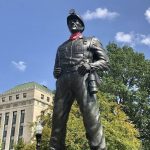 A statue of a coal miner is shown Thursday, Aug. 26, 2021, at the West Virginia Capitol in Charleston, W.Va. This weekend, marchers are retracing the steps of thousands of coal miners who participated in the Battle of Blair Mountain in southern West Virginia. At least 16 men died in the largest U.S. armed uprising since the Civil Warbefore the miners surrendered to federal troops in early September 1921. (AP Photo/John Raby)