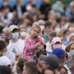 
              People wait for Pope Francis at Lokomotiva Stadium in Košice, Slovakia, Tuesday, Sept. 14, 2021. Francis first trip since undergoing intestinal surgery in July, marks the restart of his globetrotting papacy after a nearly two-year coronavirus hiatus. (AP Photo/Darko Vojinovic)
            