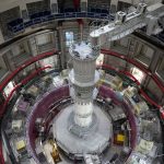 
              The ITER Tokamak machine is pictured in Saint-Paul-Lez-Durance, France, Thursday, Sept. 9, 2021. Scientists at the International Thermonuclear Experimental Reactor in southern France took delivery of the first part of a massive magnet so strong its American manufacturer claims it can lift an aircraft carrier. (AP Photo/Daniel Cole)
            
