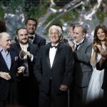 
              FILE - In this Feb. 24, 2017 file photo, French actor Jean-Paul Belmondo, center, is congratulated by actors on stage during the ceremony of the 42nd Cesar Film Awards, at the Salle Pleyel, in Paris. French New Wave actor Jean-Paul Belmondo has died, according to his lawyer’s office on Monday Sept. 6, 2021. (AP Photo/Thibault Camus, File)
            