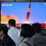 
              People watch a TV showing a file image of North Korea's missile launch during a news program at the Seoul Railway Station in Seoul, South Korea, Tuesday, Sept. 28, 2021. North Korea on Tuesday fired a suspected ballistic missile into the sea, Seoul and Tokyo officials said, the latest in a series of weapons tests by Pyongyang that raised questions about the sincerity of its recent offer for talks with South Korea. (AP Photo/Ahn Young-joon)
            