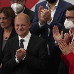 
              Olaf Scholz, Finance Minister and SPD candidate for Chancellor after addressing his supporters after German parliament election at the Social Democratic Party, SPD, headquarters in Berlin, Sunday, Sept. 26, 2021. (AP Photo/Michael Sohn)
            