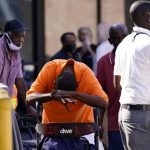 
              Occupants prepare to depart the Renaissance Place senior living apartments in the aftermath of Hurricane Ida, Friday, Sept. 3, 2021, in New Orleans. (AP Photo/Matt Slocum)
            