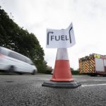 
              Vehicles arrive at a petrol station, in Manchester, England, Tuesday, Sept. 28, 2021. Thousands of British gas stations have run dry, as motorists scrambled to fill up amid a supply disruption due to a shortage of truck drivers. Long lines of vehicles formed at many gas stations over the weekend, and tempers frayed as some drivers waited for hours.  (AP Photo/Jon Super)
            