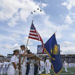 
              The Brigade of Midshipmen stand at attention during the National Anthem before an NCAA college football game between Navy and Air Force, Saturday, Sept. 11, 2021, in Annapolis, Md. (AP Photo/Terrance Williams)
            