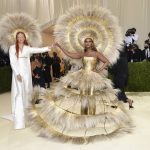 
              Harris Reed, left, and Iman attend The Metropolitan Museum of Art's Costume Institute benefit gala celebrating the opening of the "In America: A Lexicon of Fashion" exhibition on Monday, Sept. 13, 2021, in New York. (Photo by Evan Agostini/Invision/AP)
            