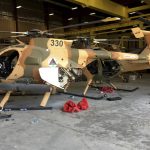 
              Damaged Afghan military helicopters are seen after the Taliban's takeover inside the Hamid Karzai International Airport in Kabul, Afghanistan, Sunday, Sept. 5, 2021. (AP Photo/Mohammad Asif Khan)
            