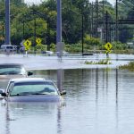 Vehicles are under water during flooding in Norristown, Pa. Thursday, Sept. 2, 2021 in the aftermath of downpours and high winds from the remnants of Hurricane Ida that hit the area. (AP Photo/Matt Rourke)