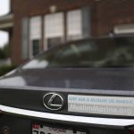 
              A sticker reading "Just ask a Muslim US Marine" sits on the back of Mansoor Shams' vehicle at his home in Baltimore, on Friday, Aug. 13, 2021. Shams, who served in the Marines from 2000 to 2004, was called names like "Taliban," "terrorist" and "Osama bin Laden" by some of his fellow Marines after 9/11. In recent years, Shams has used his identity as both a Muslim and a former Marine to dispel misconceptions about Islam. (AP Photo/Jessie Wardarski)
            