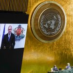 
              Bulgaria's President Rumen Radev is seen on a video screen as he addresses the 76th Session of the United Nations General Assembly remotely, Tuesday, Sept. 21, 2021 at U.N. headquarters. (AP Photo/Mary Altaffer, Pool)
            