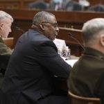 
              From left, Marine Corps Gen. Kenneth McKenzie, commander of US Central Command, Secretary of Defense Lloyd Austin and Gen. Mark Milley, chairman of the Joint Chiefs of Staff, testify before the House Armed Services Committee on the conclusion of military operations in Afghanistan, Wednesday, Sept. 29, 2021, on Capitol Hill in Washington. (Olivier Douliery/Pool via AP)
            