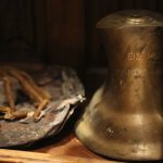 
              Candles and a small bell recovered from the original St. Nicholas Greek Orthodox Church, destroyed in the Sept. 11, 2001 attacks, are preserved at the Greek Orthodox Archdiocese of America in New York on Wednesday, Aug. 18, 2021. (AP Photo/Jessie Wardarski)
            