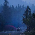 
              Fire retardant is sprayed from a truck along Highway 89 as firefighters continue to battle the Caldor Fire near South Lake Tahoe, Calif., Thursday, Sept. 2, 2021. (AP Photo/Jae C. Hong)
            