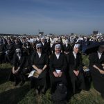 
              Nuns attend a Mass celebrated by Pope Francis in the esplanade of the National Shrine in Sastin, Slovakia, Wednesday, Sept. 15, 2021. Pope Francis celebrated an open air Mass in Sastin, the site of an annual pilgrimage each September 15 to venerate Slovakia's patron, Our Lady of Sorrows. (AP Photo/Petr David Josek)
            