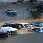 
              FILE - In this Sept. 2, 2021, file photo, vehicles are submerged in water during flooding in Philadelphia in the aftermath of downpours and high winds from the remnants of Hurricane Ida that hit the area. (AP Photo/Matt Rourke, File)
            