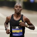 
              Benson Kipruto, of Kenya, runs during the 125th Boston Marathon, Monday, Oct. 11, 2021, in Boston. Kipruto won the men's division of the marathon. (AP Photo/Steven Senne)
            