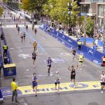 
              Runners cross the finish line at the Boston Marathon in Boston, on Monday, Oct. 11, 2021. (AP Photo/Charles Krupa)
            