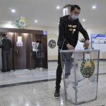 
              A man casts his ballot at a polling station during the presidential election in Tashkent, Uzbekistan, Sunday, Oct. 24, 2021. Uzbeks voted Sunday in a presidential election that the incumbent is expected to win in a landslide against weak competition. Although Shavkat Mirziyoyev has relaxed many of the policies of his dictatorial predecessor, he has made little effort at political reform. He took office in 2016 upon the death of Islam Karimov and faces four relatively low-visibility candidates who did not even show up for televised debates. (AP Photo)
            