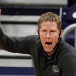 
              FILE - Gonzaga head coach Mark Few calls a play for his team as they play against Oklahoma in the first half of a second-round game in the NCAA men's college basketball tournament at Hinkle Fieldhouse in Indianapolis, in this Monday, March 22, 2021, file photo. Gonzaga carried a No. 1 ranking all last season before falling a win short of becoming college basketball’s first unbeaten national champion in 45 years. Mark Few’s Bulldogs start this season in the same position, hoping to complete that final step this time around. The Zags were the runaway top choice in The Associated Press Top 25 men’s college basketball preseason poll released Monday, Oct. 18, 2021. (AP Photo/Michael Conroy, File)
            