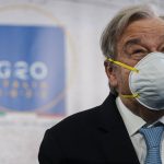 
              United Nations Secretary General Antonio Guterres wears a face mask at the end of a press conference in Rome, Friday, Oct. 29, 2021. Guterres blamed geo-political divides for hampering a global vaccination plan to reach "everyone, everywhere" to fight the COVID-19 pandemic. (AP Photo/Domenico Stinellis)
            