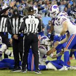 
              Buffalo Bills quarterback Josh Allen (17) is helped up after his run was ruled short of the distance needed for a first down on the Bills' final play of the game against the Tennessee Titans in an NFL football game Monday, Oct. 18, 2021, in Nashville, Tenn. The Titans won 34-31. (AP Photo/Mark Zaleski)
            