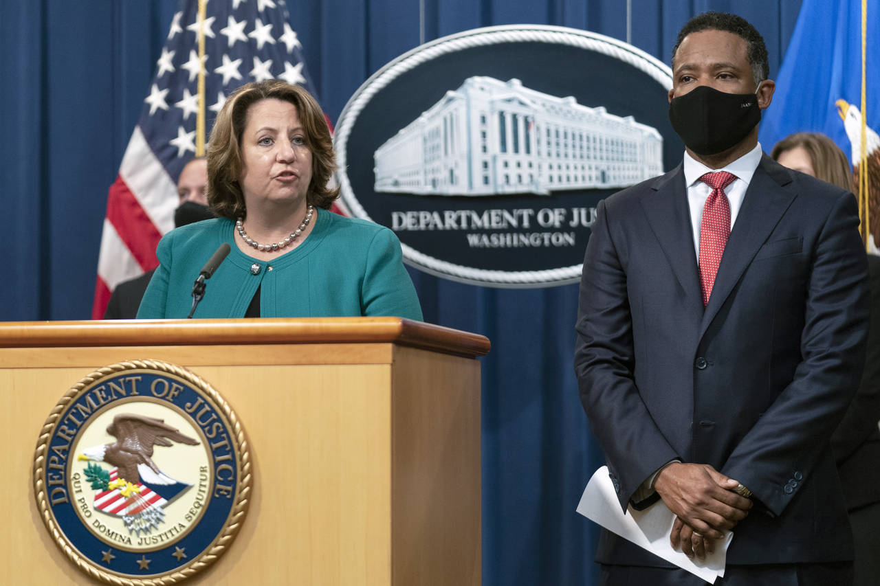 Deputy Attorney General Lisa Monaco, with Assistant Attorney General Kenneth Polite Jr. of the Just...