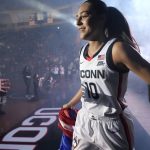 Connecticut's Nika Muhl is introduced during UConn's men's and women's basketball teams annual First Night celebration, Friday, Oct. 15, 2021, in Storrs Conn. (AP Photo/Jessica Hill)