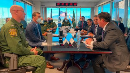 Arizona Gov. Doug Ducey, bottom right, was briefed by Border Patrol agents at the Tucson sector hea...