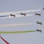 
              Al Fursan, the United Arab Emirates Air Force's aerobatic team, performs at the Dubai Air Show in Dubai, United Arab Emirates, Wednesday, Nov. 17, 2021. (AP Photo/Jon Gambrell)
            