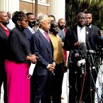 
              The Reverend Al Sharpton of the National Action Network holds a news conference at the Glynn County courthouse during the trial of Greg McMichael and his son, Travis McMichael, and a neighbor, William "Roddie" Bryan, Wednesday, Nov. 10, 2021, in Brunswick, Ga.  The three are charged with the February 2020 slaying of 25-year-old Ahmaud Arbery.  (AP Photo/Lewis M. Levine)
            
