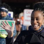 
              Democratic candidate Shontel Brown waves to voters at the Bedford community Center, Tuesday, Nov. 2, 2021, in Bedford Heights, Ohio. Brown is running for Ohio's 11th Congressional District. (AP Photo/Tony Dejak)
            