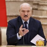 
              FILE - Belarusian President Alexander Lukashenko gestures as he speaks during a meeting of the Constitutional Commission in Minsk, Belarus, on Sept. 28, 2021. Thousands of migrants have flocked to Belarus’ border with Poland hoping to get to Western Europe, an influx that has prompted Polish authorities to introduce a state of emergency and deploy thousands of troops and police. The European Union has accused Lukashenko of using migrants as pawns in a “hybrid attack” against the 27-nation bloc in retaliation for the EU sanctions against his government for its brutal crackdown on protests. (Maxim Guchek/BelTA photo via AP, File)
            