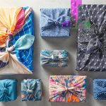 
              This image provided by Better Homes & Gardens shows fabric-wrapped gifts. (Jacob Fox/Better Homes & Gardens via AP)
            