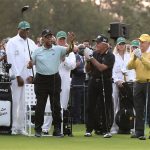 
              Honorary starter Lee Elder, left, is applauded by fellow honorary starters Gary Player, center, and Jack Nicklaus during introductions for the ceremonial tee shots to begin the Masters golf tournament at Augusta National Golf Club in Augusta, Ga., Thursday, April 8, 2021. Lee Elder, who broke down racial barriers as the first Black golfer to play in the Masters and paved the way for Tiger Woods and others to follow, has died at the age of 87. The PGA Tour announced Elder’s death, which was first reported Monday by Debert Cook of African American Golfers Digest. No cause was given, but the tour confirmed Elder's death with his family. (Curtis Compton /Atlanta Journal-Constitution via AP)
            